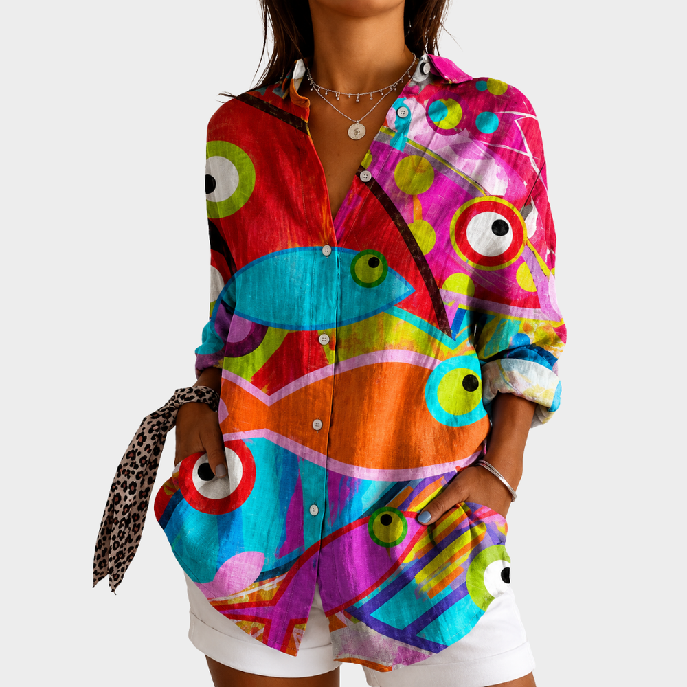 Bold mosaic blouse in multicolour print, front view worn with white shorts