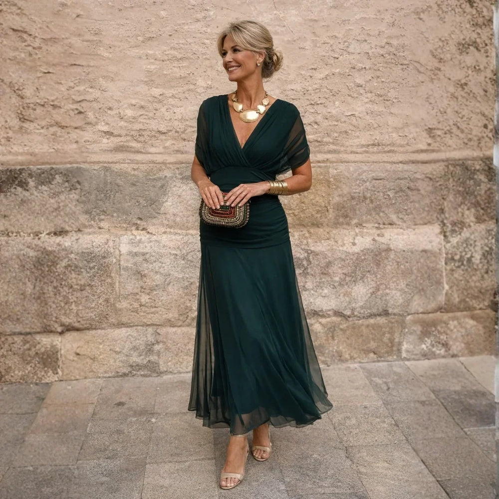 Eliza elegant maxi dress in deep green, full-length front view