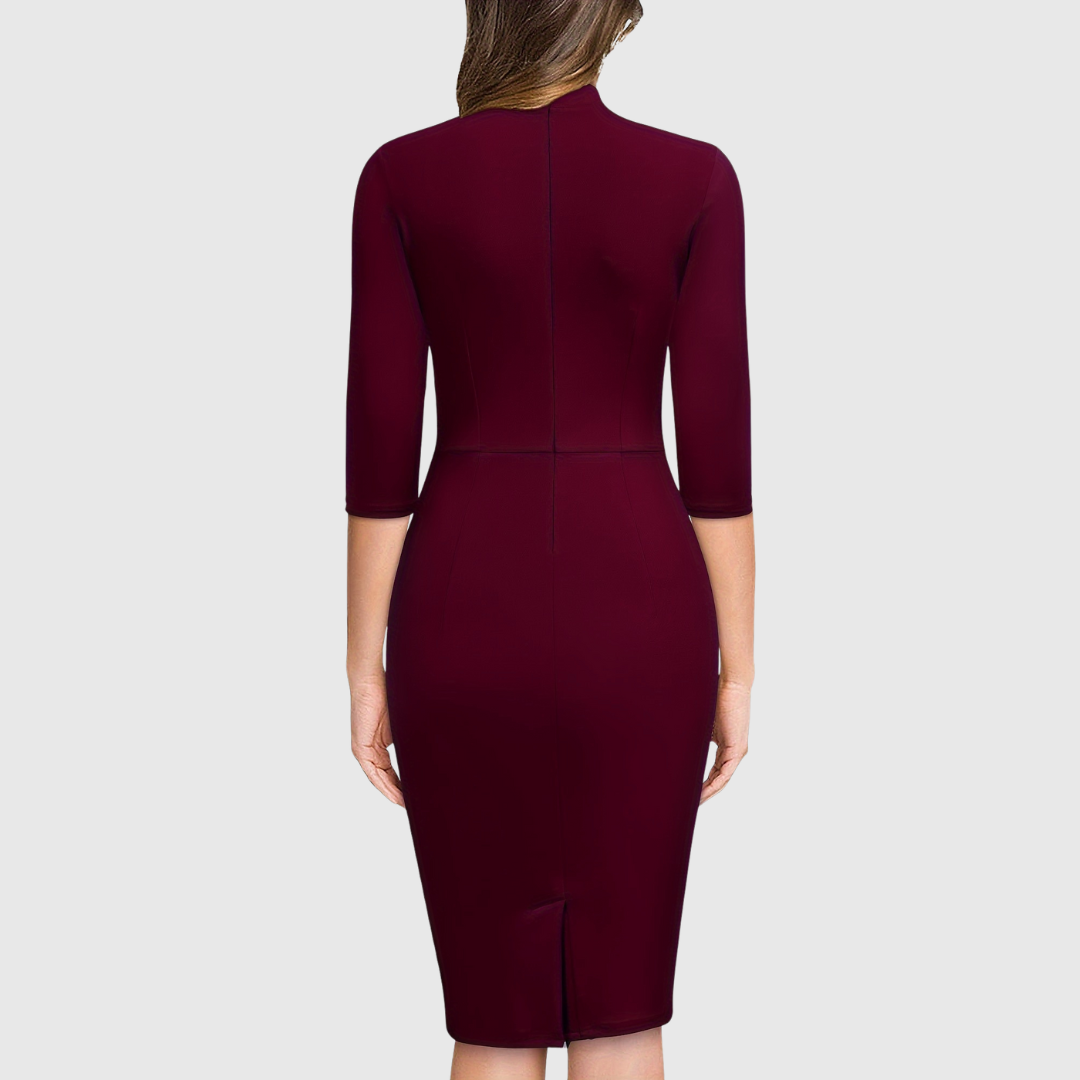 Hariethe tie-neck sheath dress in deep red, back view with hem slit