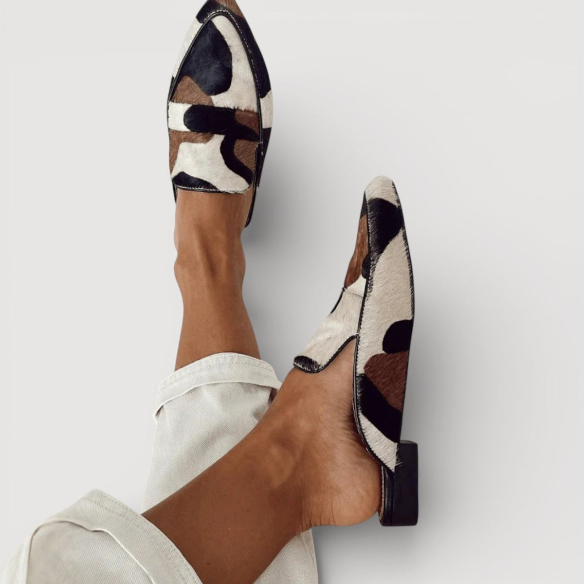 Cecilia minimalist loafers in patchwork print, side view of open back