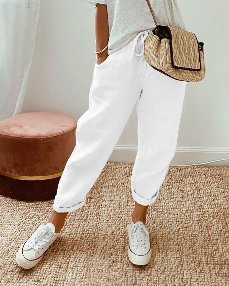 Agatha relaxed summer trousers in white, front view with drawstring waist