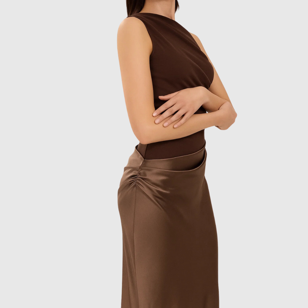 Elara evening gown in brown, close-up of gathered waist detail