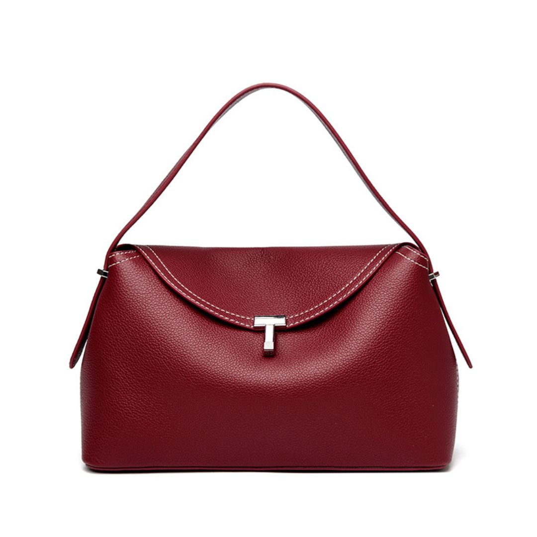 La Divine structured handbag in ruby red, front view