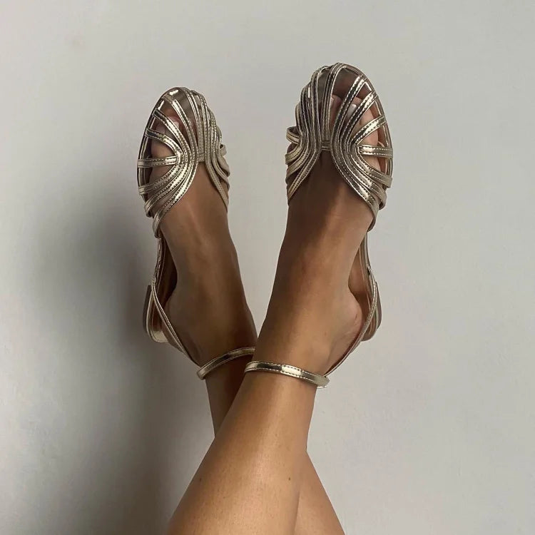 Vittoria jewel sandals in gold, angled view of strap detail