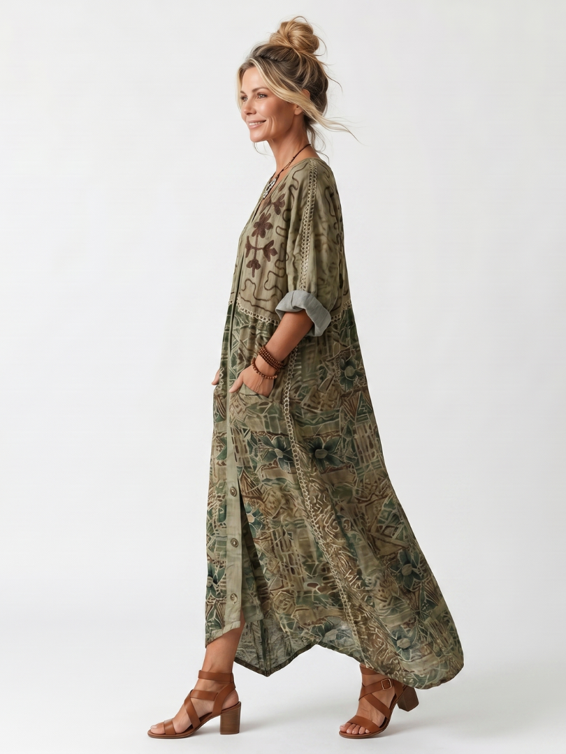 Aleta embroidered midi dress in green, side view mid-stride