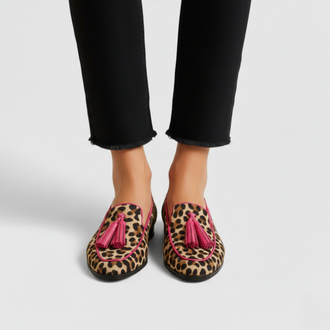 Elizabeth leopard loafers with pink tassels, front view on model