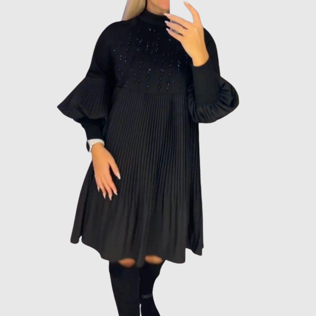 Elodie pleated puff-sleeve gown in black, three-quarter view on model