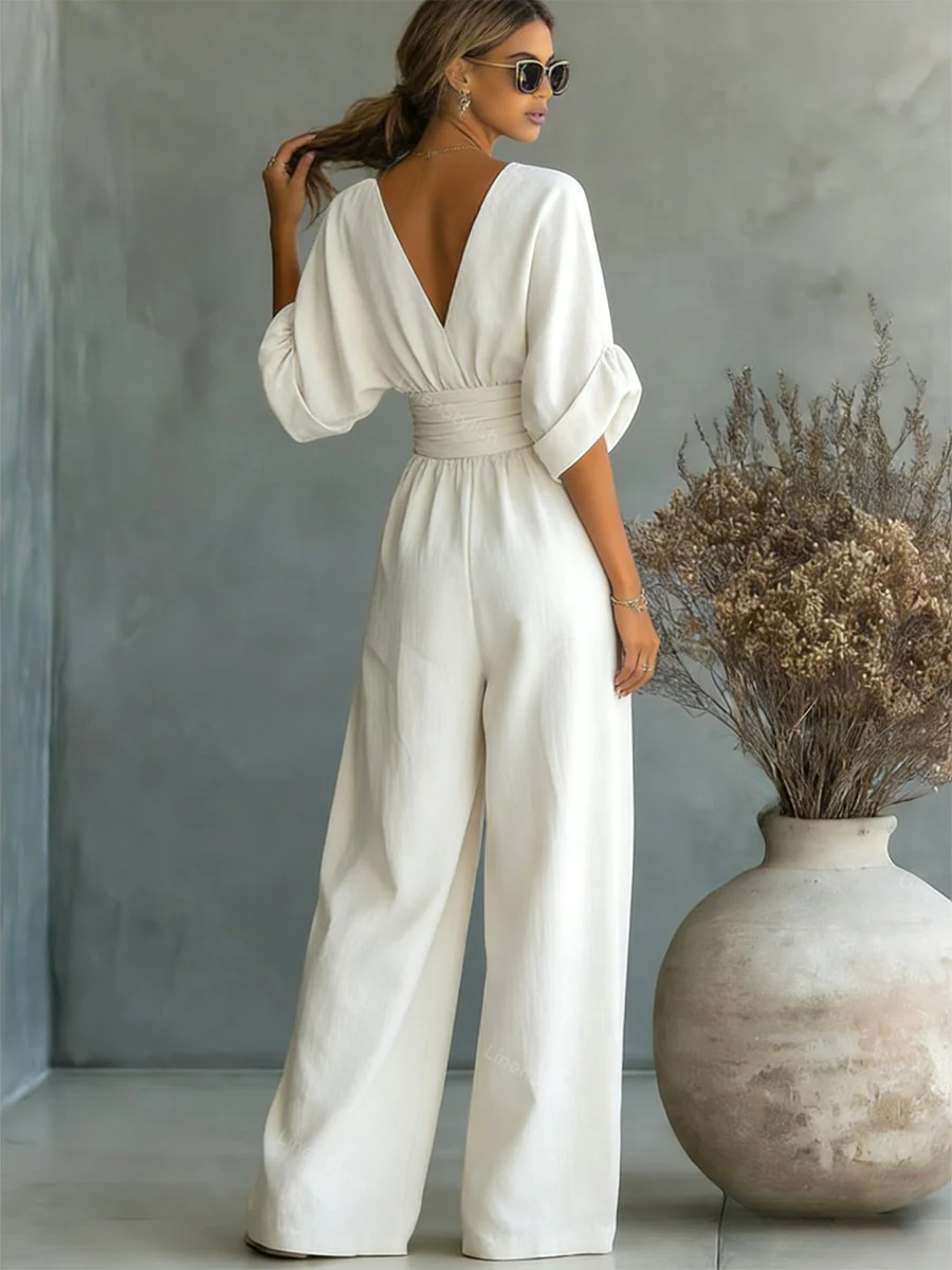 Sofia jumpsuit in white, back view showing low V back