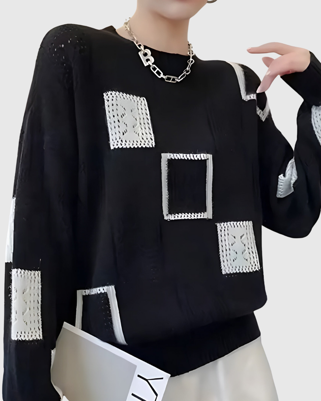 Vionelle chic sweater in black, close-up of crochet patch detail