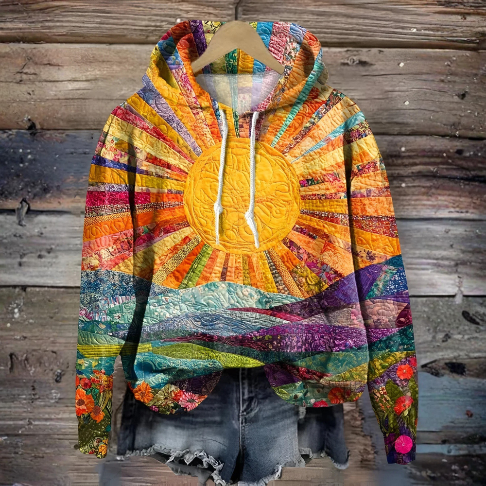 Blyxanne hoodie in multi-coloured patchwork sunrise print, front view on hanger