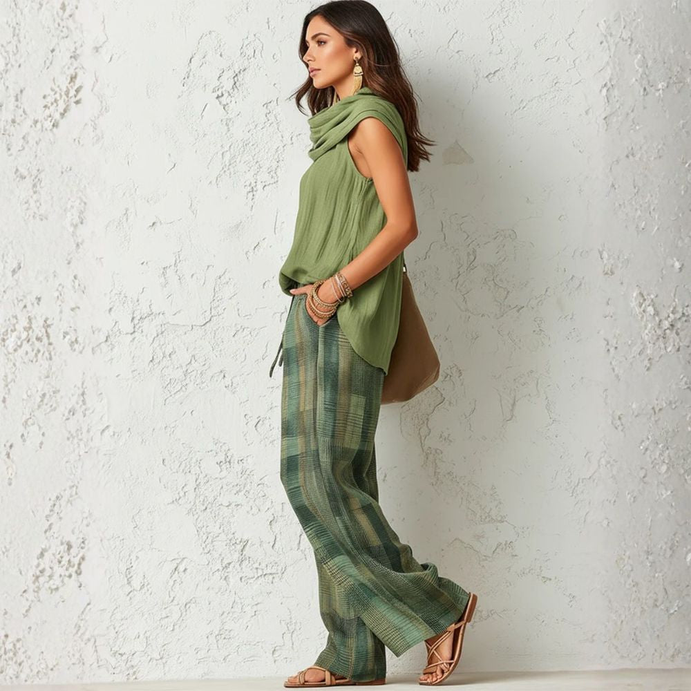 Auristela two-piece set in sage green, side view showing draped cowl top