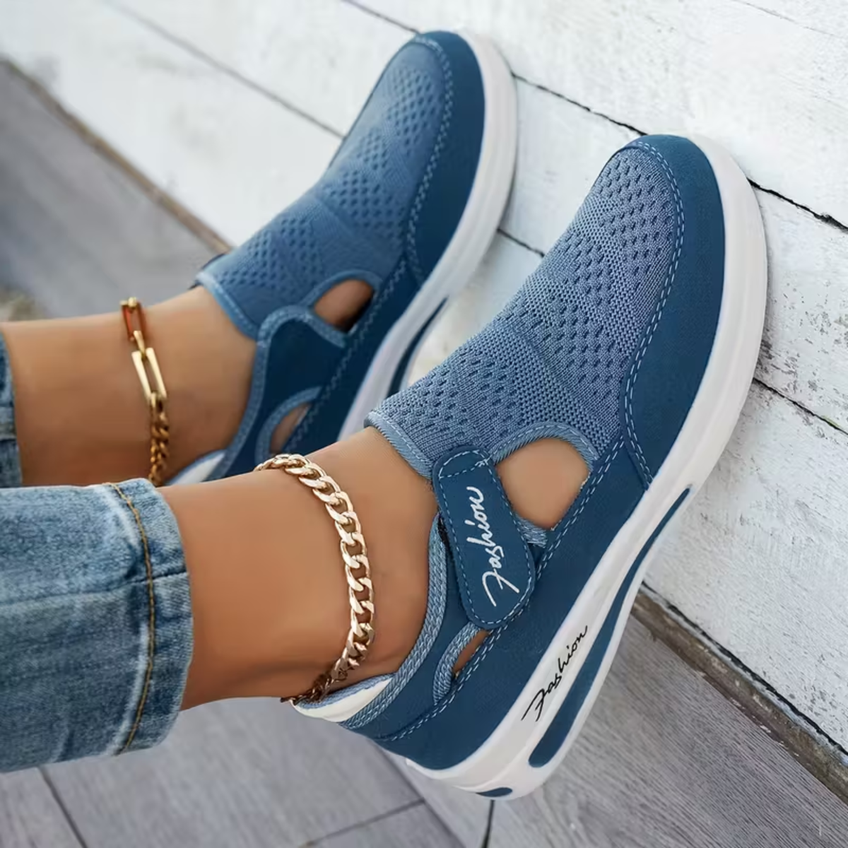 Allison sneakers in blue, close-up of mesh upper and tab