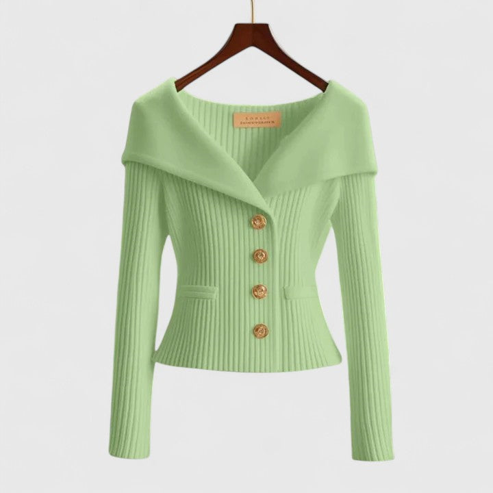 Elara soft knit cardigan in soft green, front view on hanger