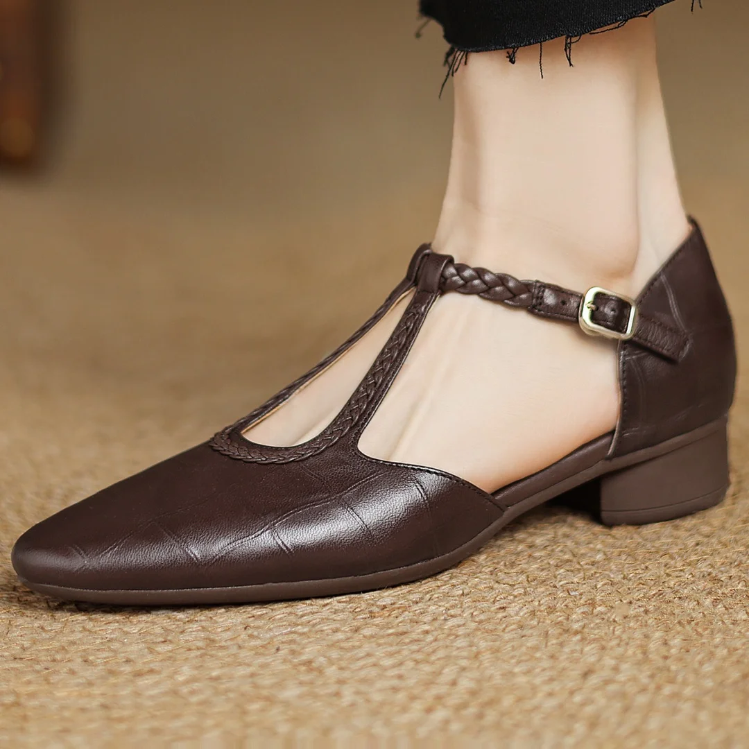 Evelyn Mary Janes in brown, worn side view on textured floor