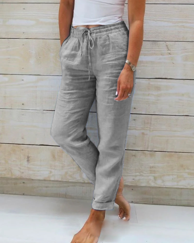 Averie relaxed drawstring trousers in grey, full-length front view
