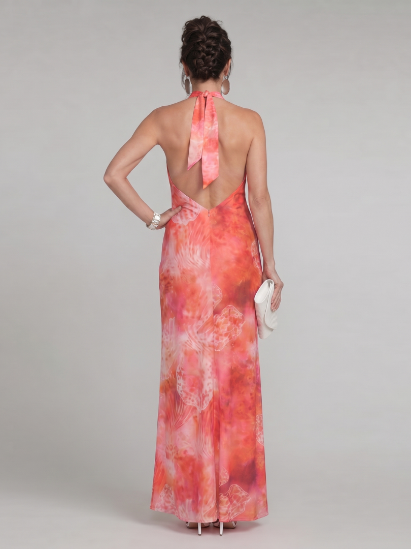 Coraline halter maxi dress in coral print, open back view with neck tie