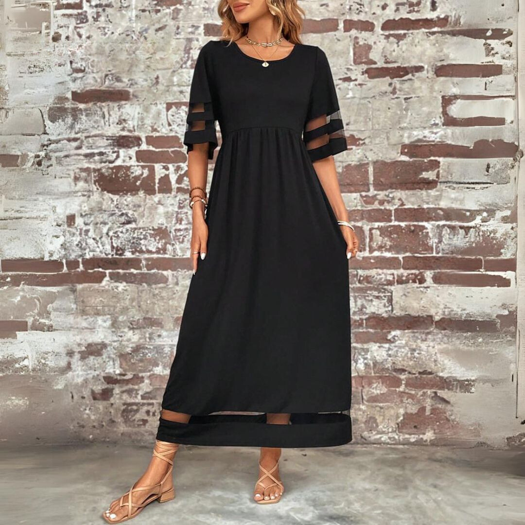 Aubrey midi dress in black, side view showing flowing skirt