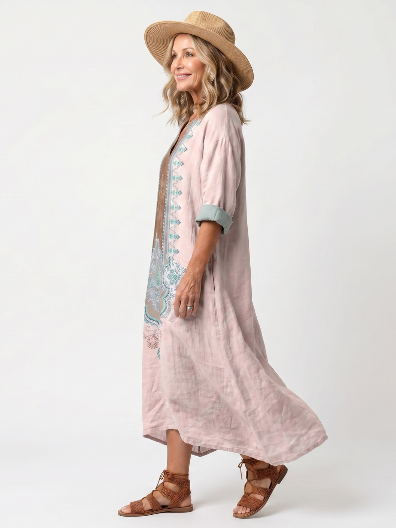 Kenza embroidered midi dress in pink, side view showing relaxed drape