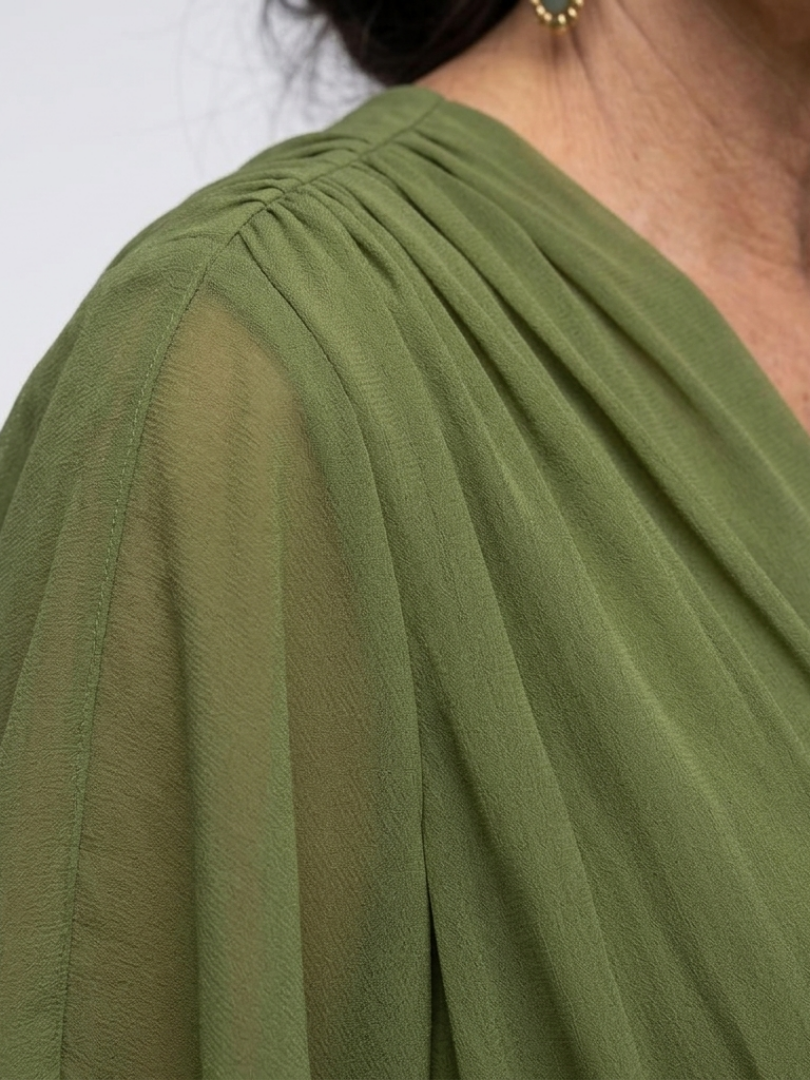 Elysia midi dress in green, close-up of draped shoulder and sleeve