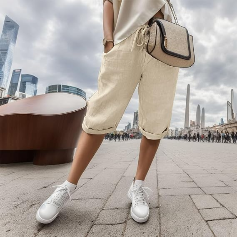 Noa cotton linen shorts in beige, front view on model