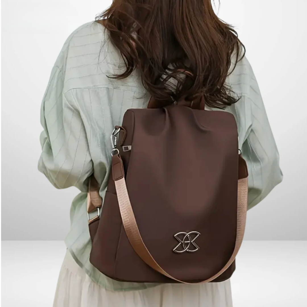Rosalba anti-theft backpack in brown, worn on the back