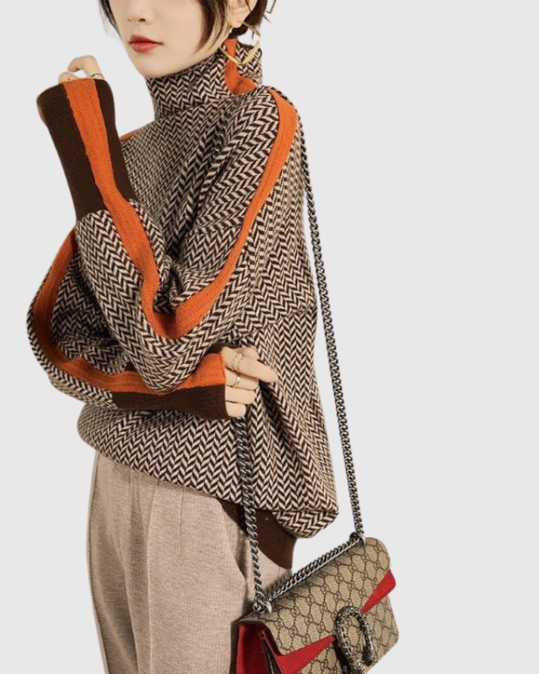 Celianne turtleneck sweater in orange and brown, front view with sleeve stripe
