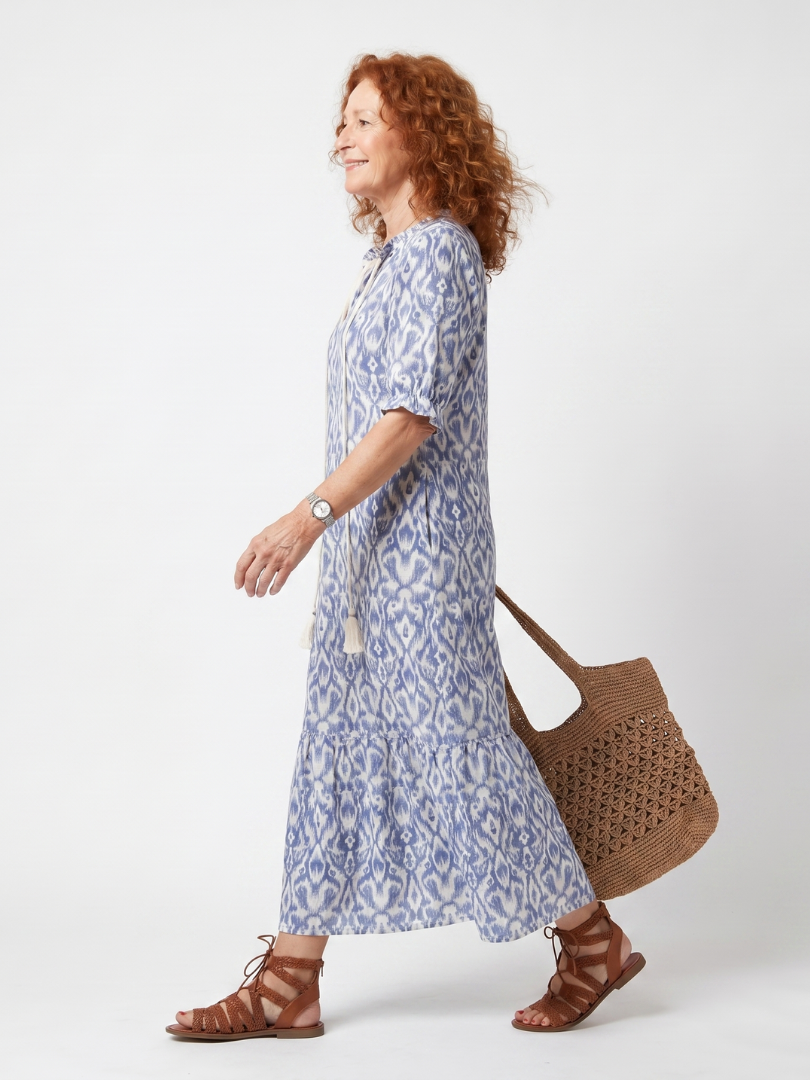 Ottoline printed midi dress in blue, walking side view