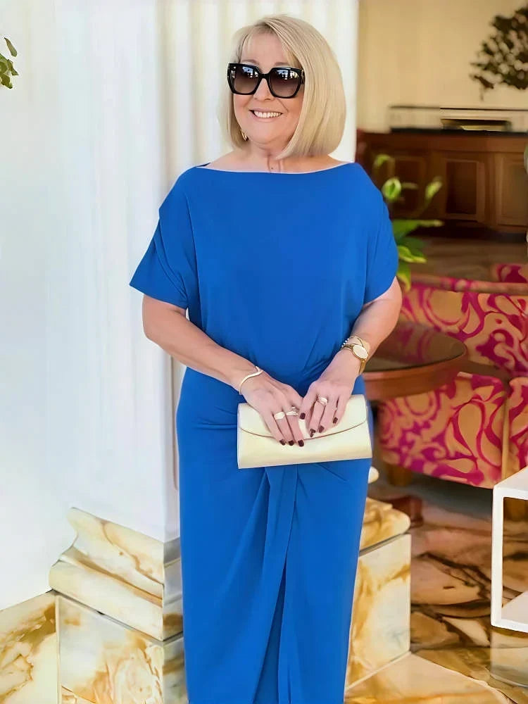 Loose pleated midi dress in blue, close view of neckline and sleeves