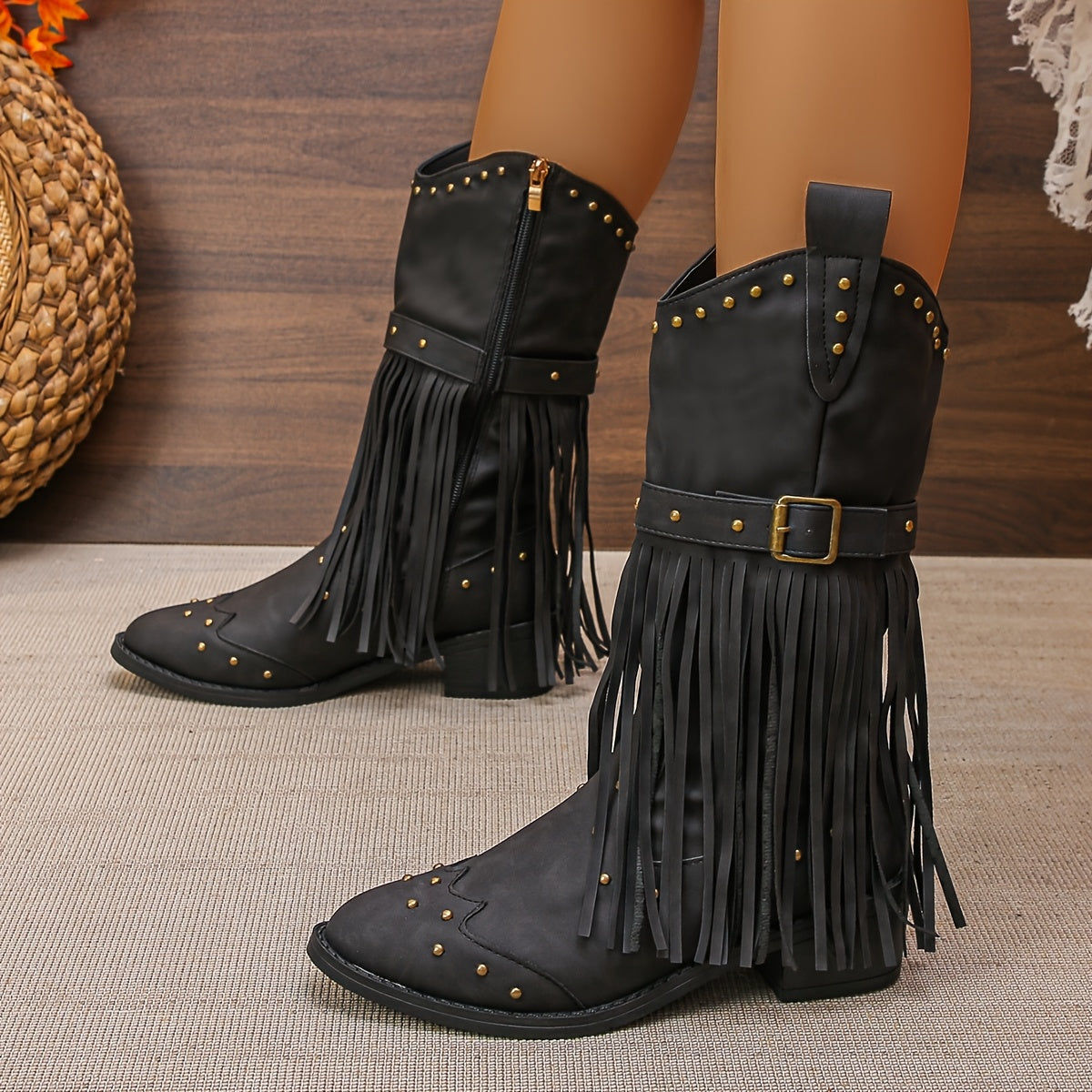 Aurelia western boots in black, side view with swinging tassels