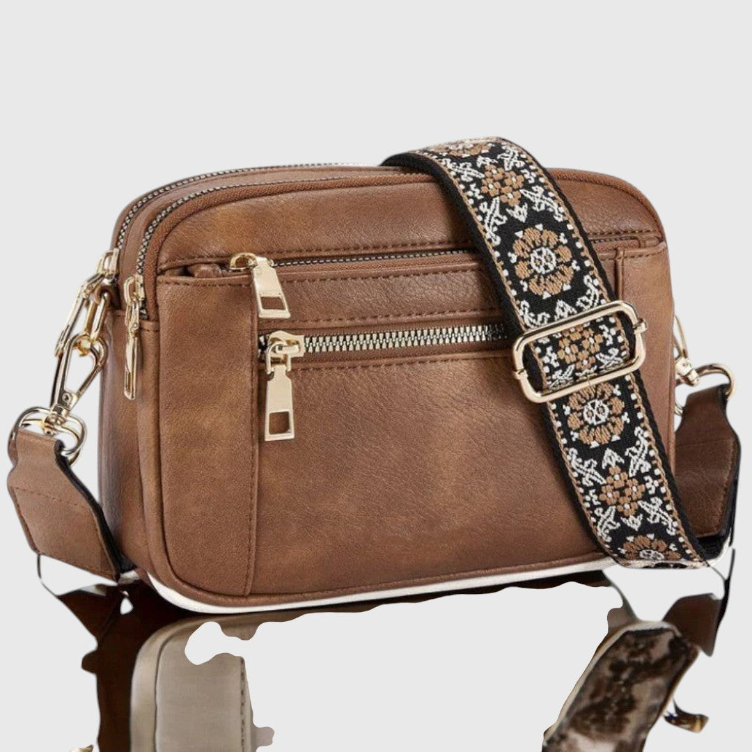 Dina shoulder bag in brown with patterned woven strap, front view