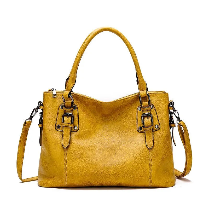 Evadne elegant shoulder bag in yellow, front view