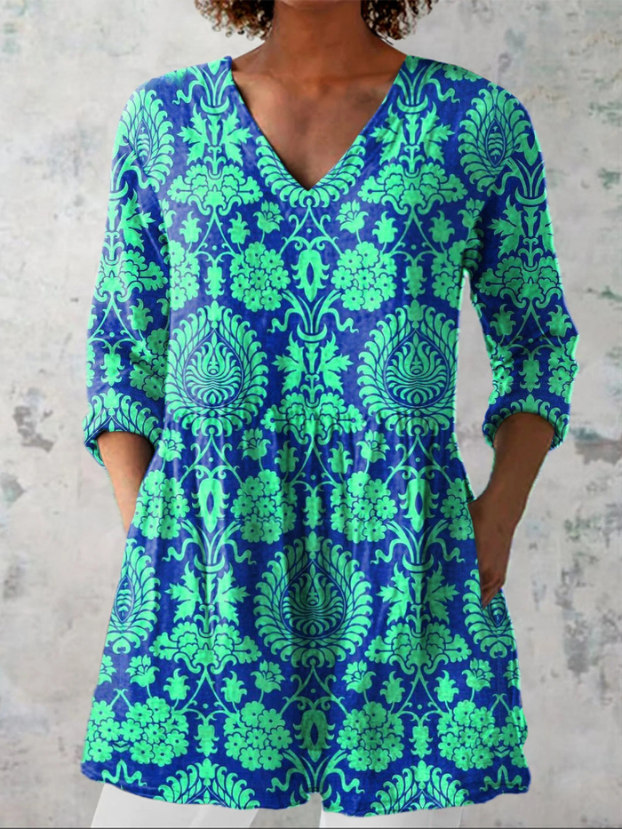 Ines long V-neck blouse in teal with green damask print, front view