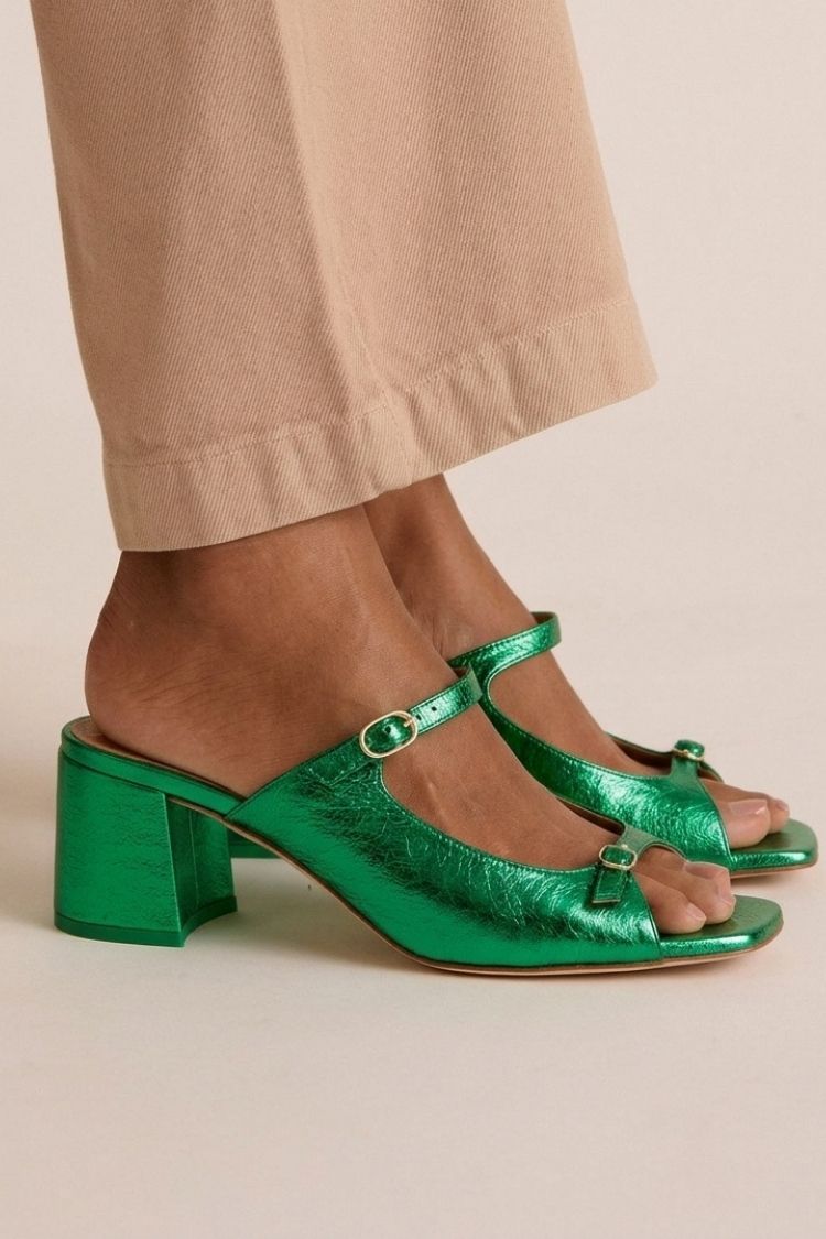 Green cut-out slingback block heels, worn side view