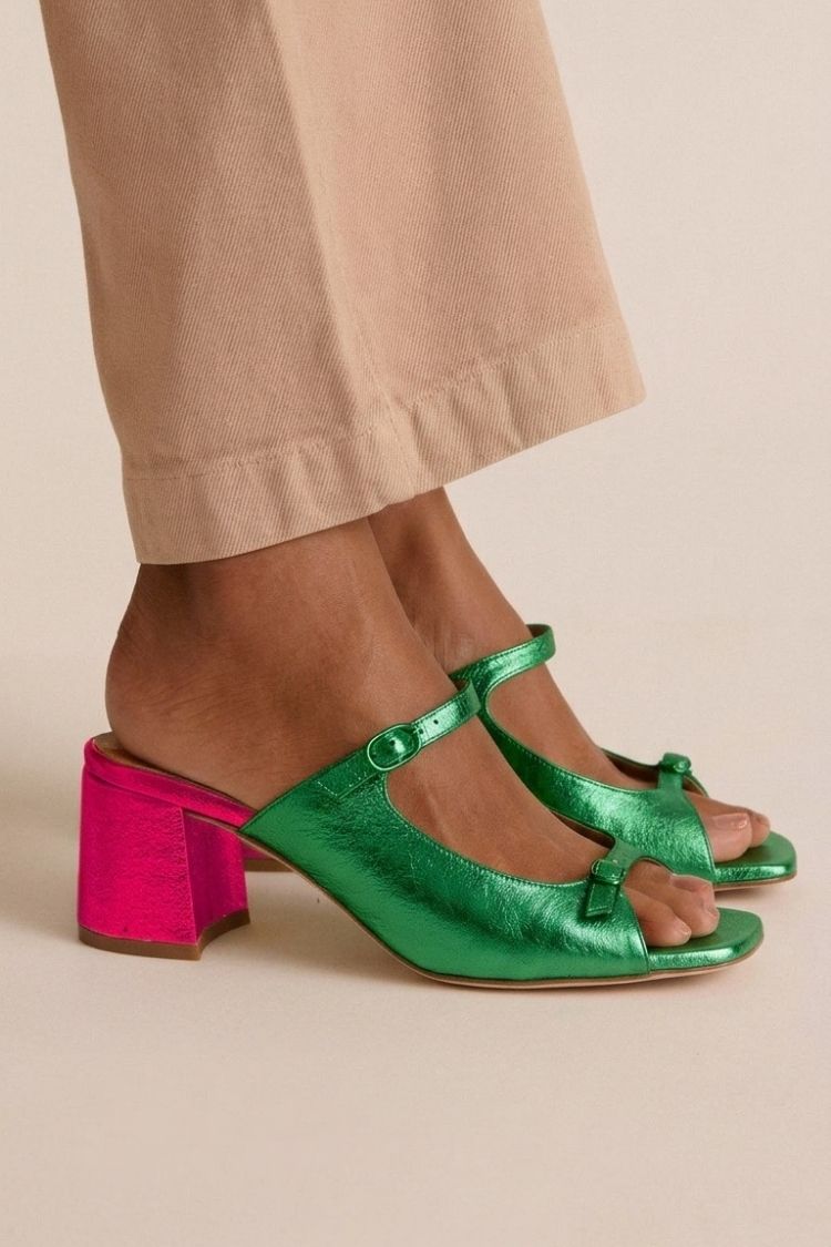 Green cut-out slingback heels with pink contrast block heel, side view