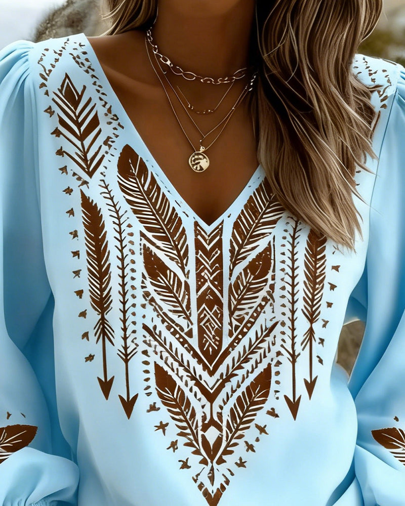 Sienna boho blouse in light blue, close-up of V-neckline and print