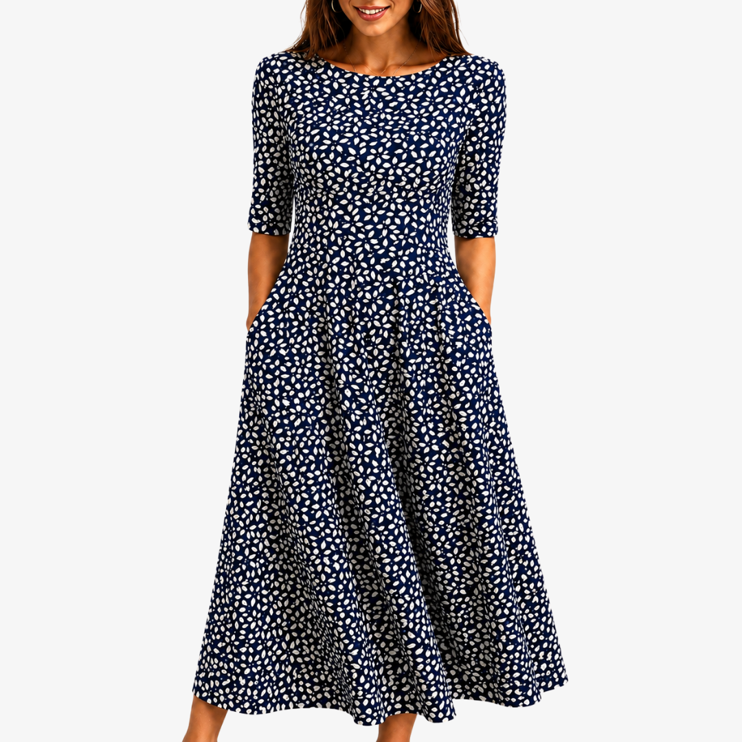 Midnight Bloom pocket maxi dress in navy with ivory print, full-length front view