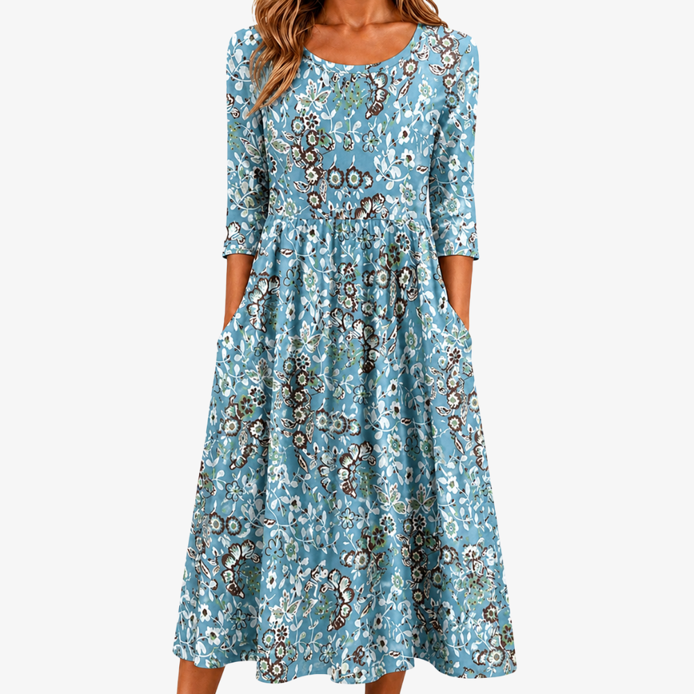 Coastal Garden pocket maxi dress in soft blue floral print, full-length front view