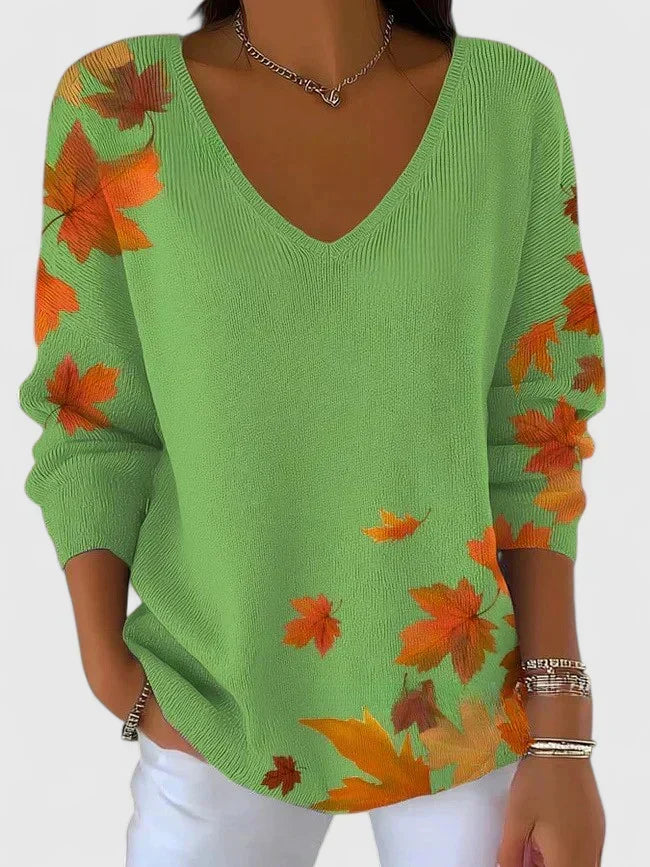 Sera V-neck sweater in green with maple leaf print, front view