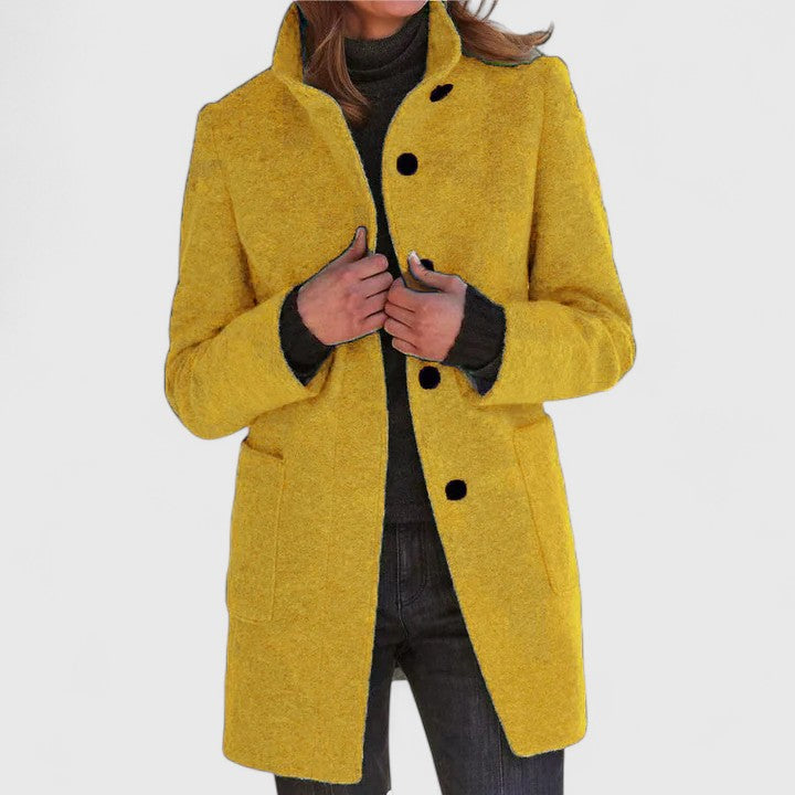 Harriette elegant coat in yellow, front view worn open