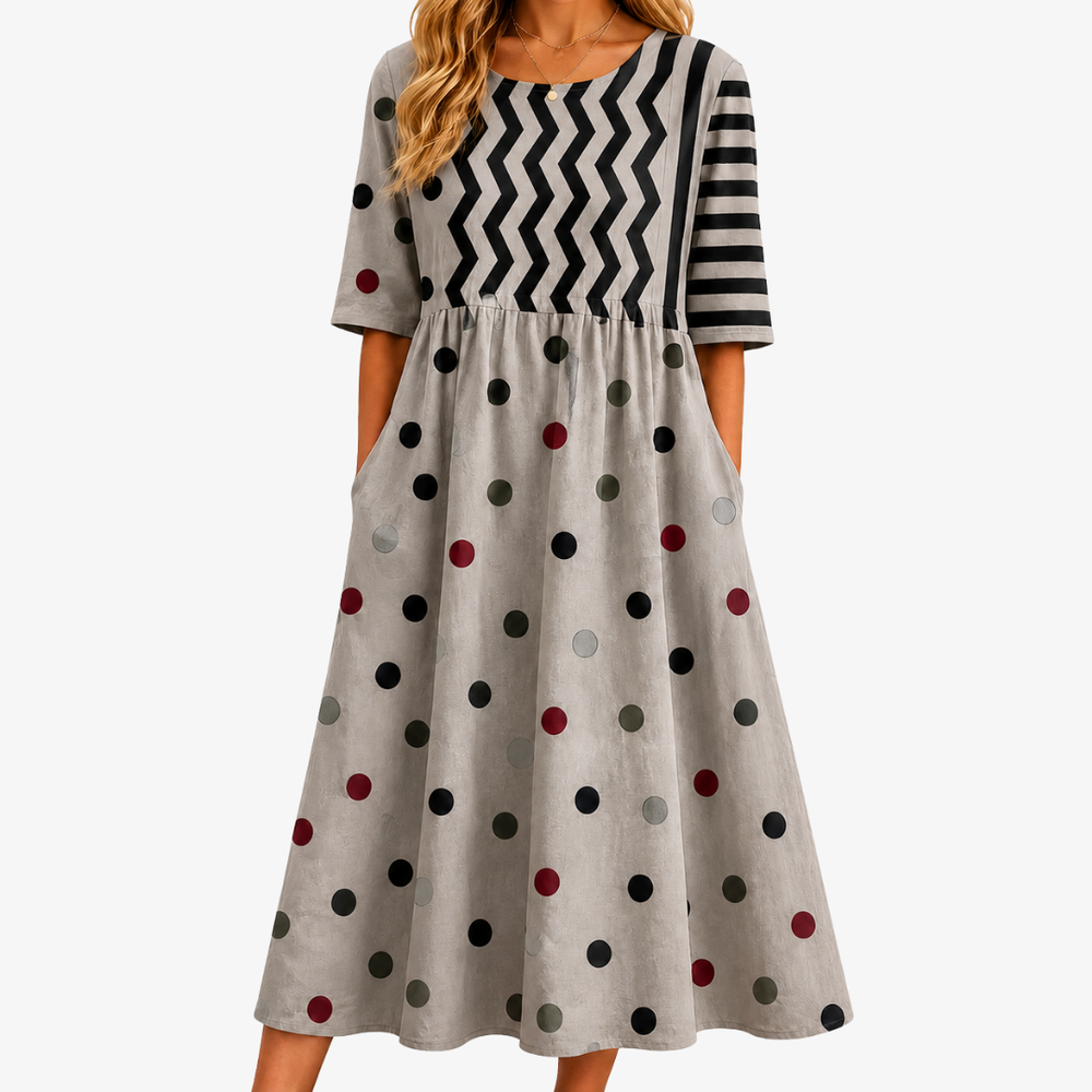 Mixed print pocket midi dress in grey with polka dots, chevron and stripes, front view
