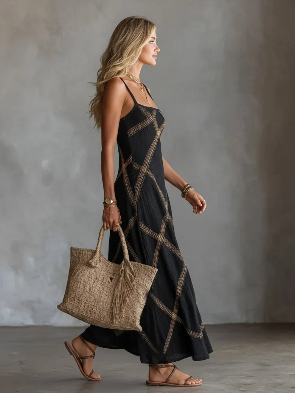 Melisa geometric maxi dress in black, side view showing A-line drape