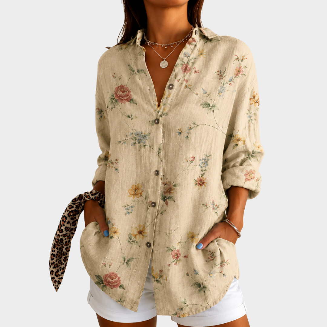 Meadow wildflower blouse in sand beige floral print, front view with collar and pockets