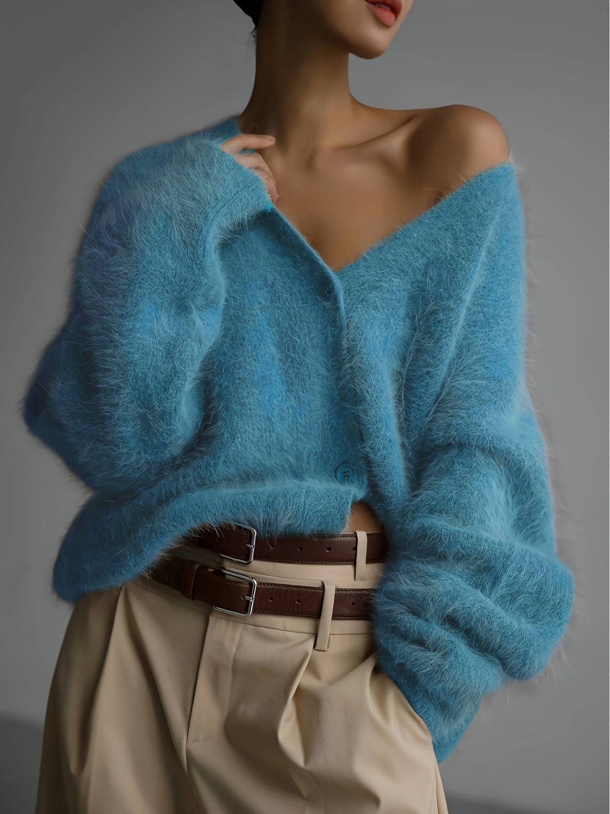 Seriavi V-neck cardigan in water lake blue, front view on model