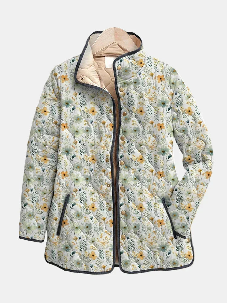 Nola floral quilted jacket in cream and yellow, front view with stand collar