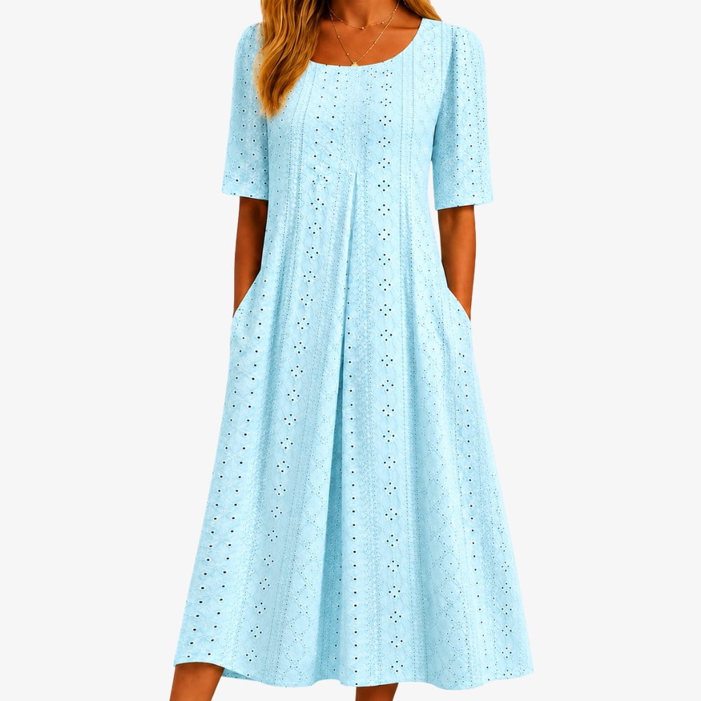 Skylight Grace eyelet midi dress in sky blue, front view with side pockets