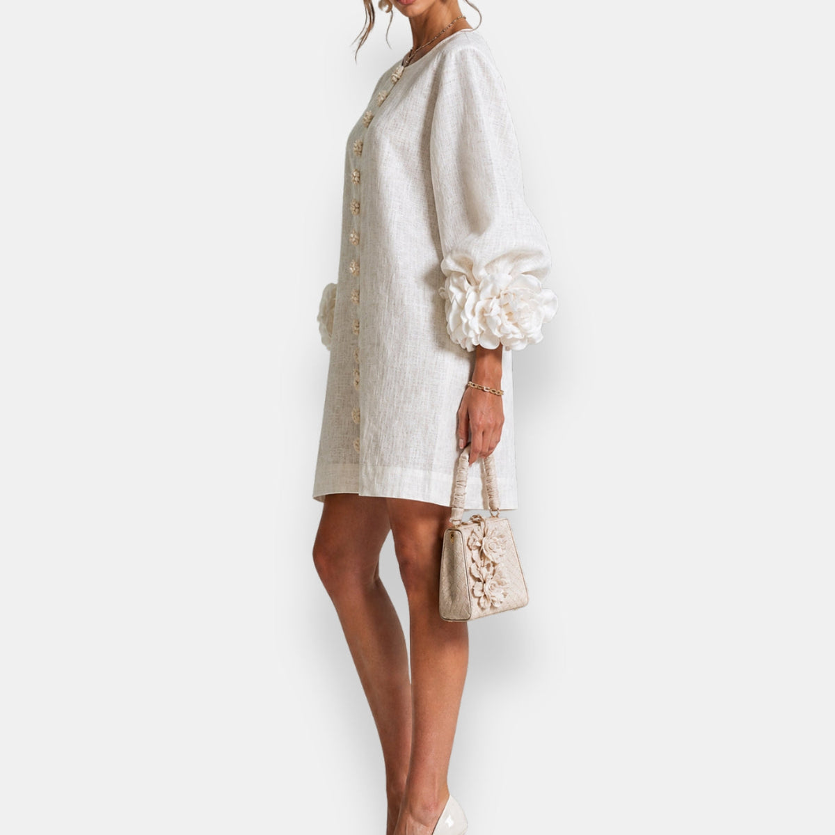 Cecily sculpted floral button dress in white, side view