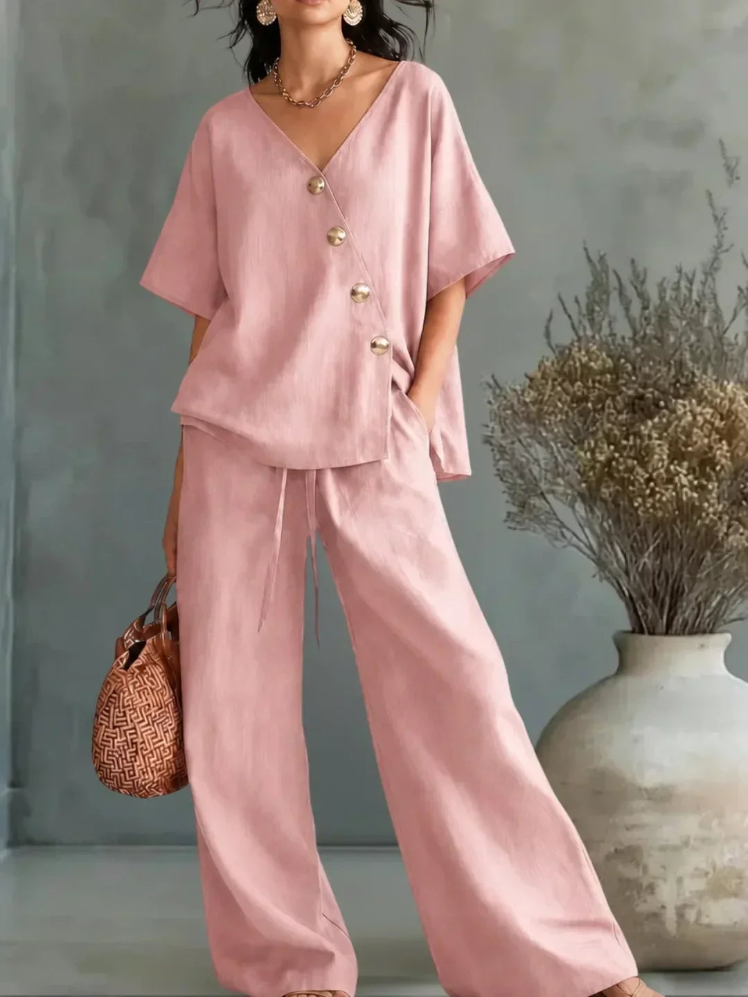 Celia V-neck button set in pink, full-length front view