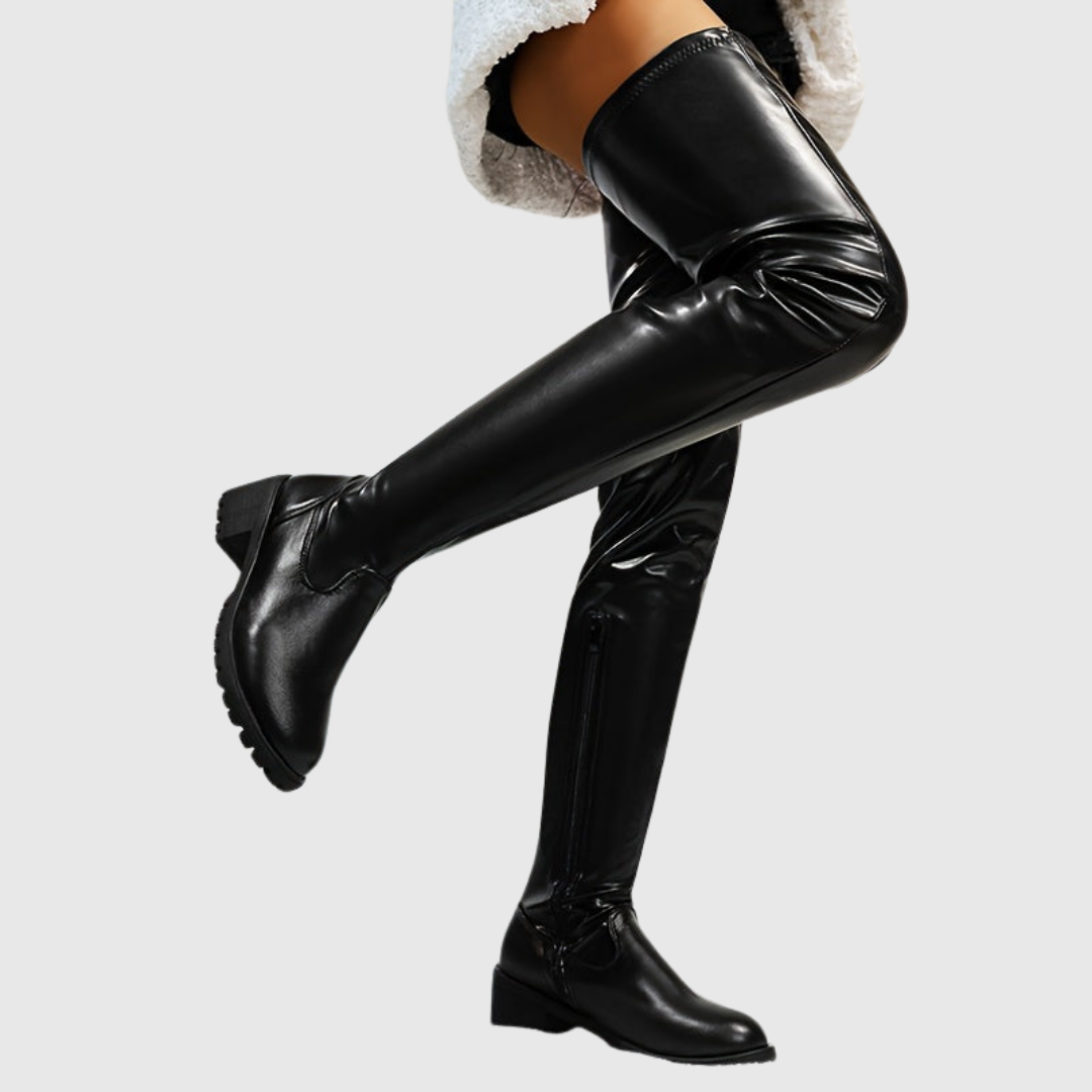 Fenisse thigh-high boots in black, side view on model
