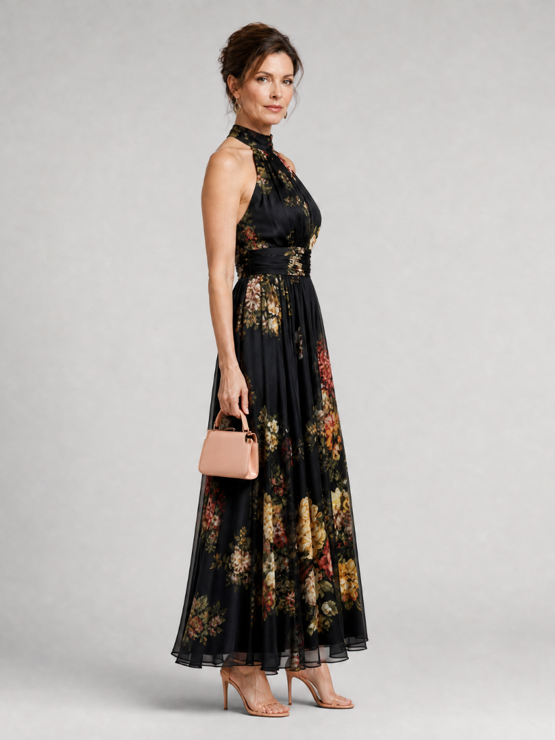 Sior floral midi dress in black, side view with clutch bag