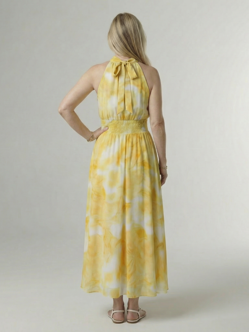 Sylin halter midi dress in yellow, back view with neck bow tie